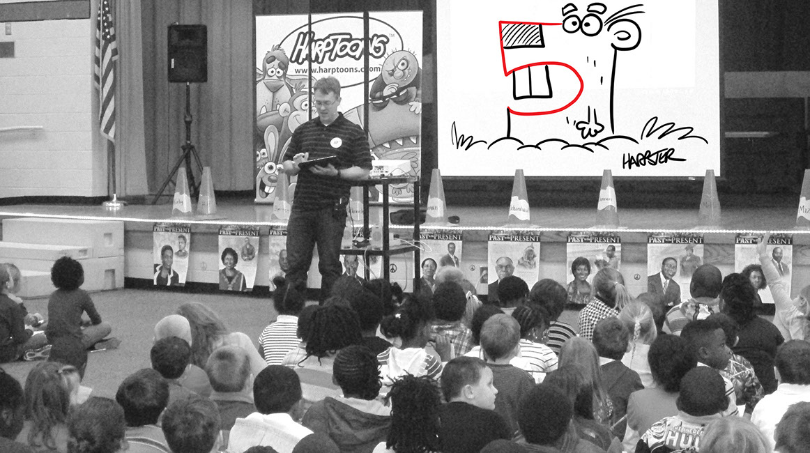 Steve Harpster drawing with elementary school students